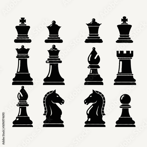 A complete set of black chess pieces, including the king, queen, and knight, ready for a strategic game on a wooden board