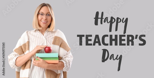 Female teacher with books a...