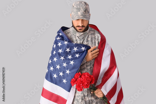 Male soldier with USA flag ...