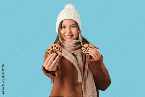 Cute teenage girl in warm c...
