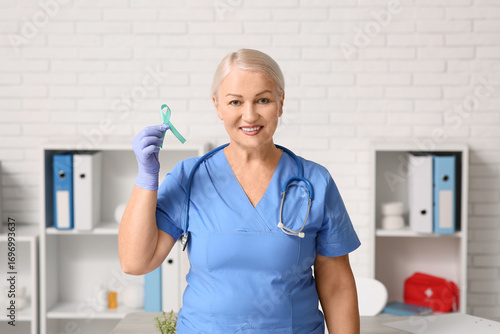Mature female doctor with t...