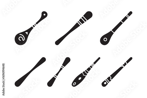 Collection of hand drawn utensil silhouettes with decorative elements