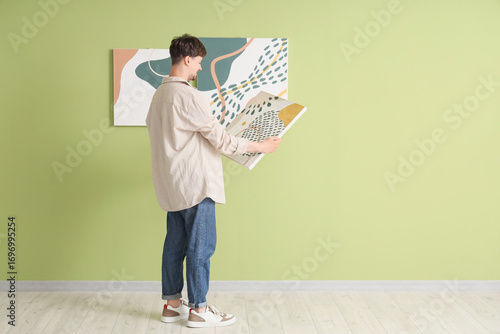 Young man hanging abstract ...