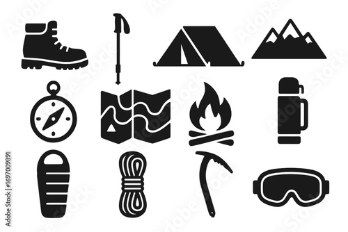 Mountain Adventure Icons. Solid style icons of mountain adventure: hiking boots, trekking pole, alpine tent, mountain peak,