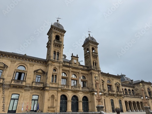 San Sebastian City Hall historic building with ornate architecture, photographed on August 16, 2025, under a summer sky in Donostia, Basque Country, Spain