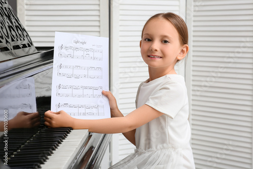 Cute little happy girl with...