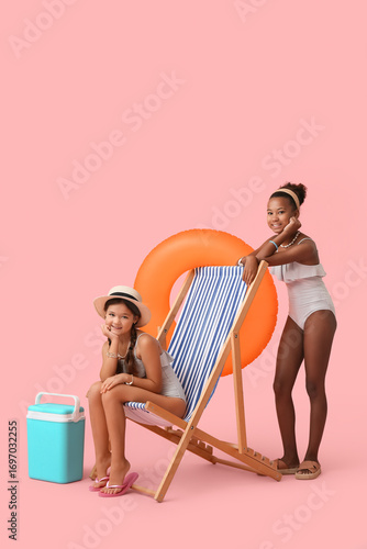 Cute little girls in swimsu...