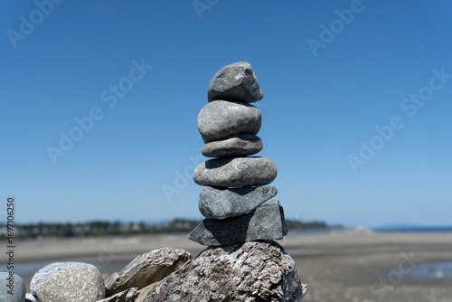Inukshuk stacked on a sunny summer's day