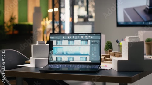 Wallpaper Mural Empty real estate development office filled with blueprints and 3D models, modern architectural software ready for planning and site preparation. Smart city project approval and management. Torontodigital.ca