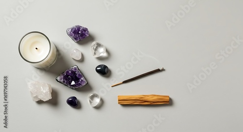Flat lay of meditation essentials crystals, candle, and incense on neutral surfaceeee