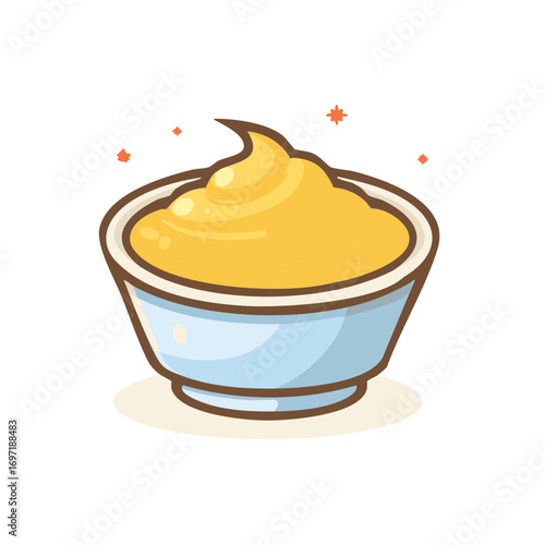 Creamy yellow sauce or dip in a light blue bowl with a brown rim, adorned with tiny orange sparks.