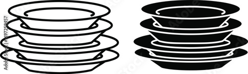 Stacked plates and bowls in black and white for contrast