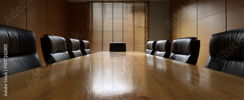 Executive conference room, elegant board table and leather chairs, meeting space