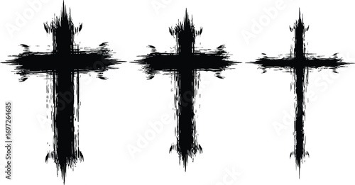 Three grunge black crosses with rough edges on white background