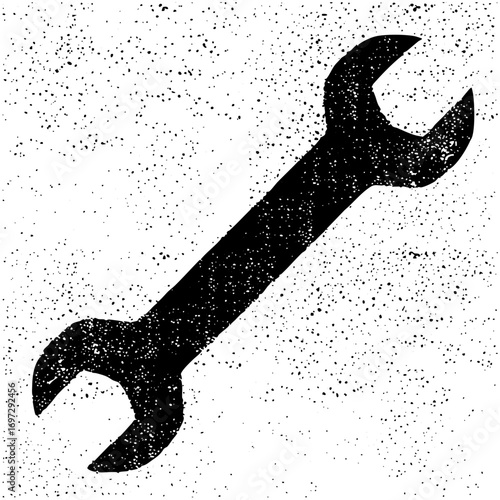 Vector Distressed black wrench with a textured finish.