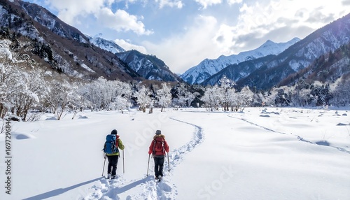Hikers in snowy mountains