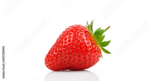 Close-up of a ripe and juicy strawberry with vibrant color and green leaves