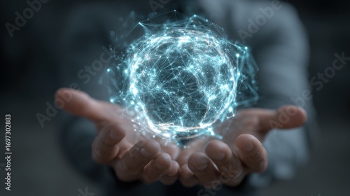 Hands cradling a glowing, interconnected network sphere with shallow depth of field. Soft, blurred background