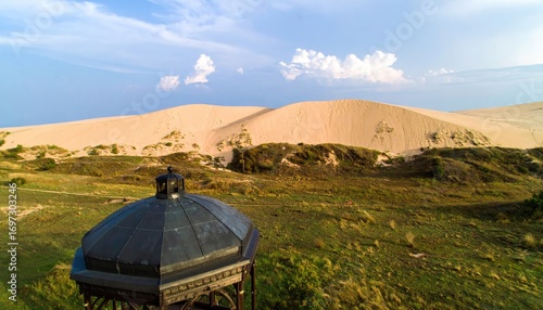 Fototapeta Naklejka Na Ścianę i Meble -  Aerial View of Beige Sand Dunes with Gazebo