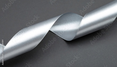 Silver Satin Ribbon on Dark Gray Background