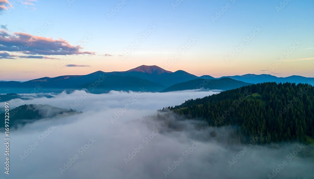 Fototapeta premium Misty mountain range at dawn (1)