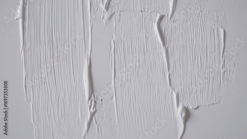 Abstract White Paint Texture Background: Close-Up Strokes and Surface Detail