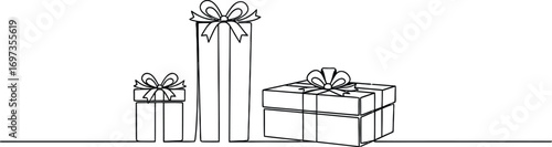 Three beautifully wrapped gift boxes with ribbons, ready for celebration