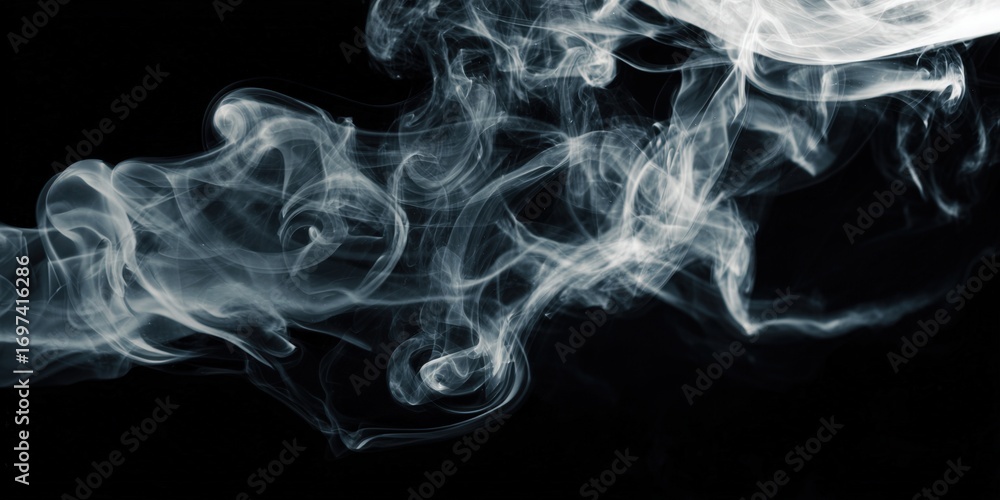 Obraz premium Ethereal wisps of white smoke dance and swirl across a deep, black backdrop creating an artistic display.