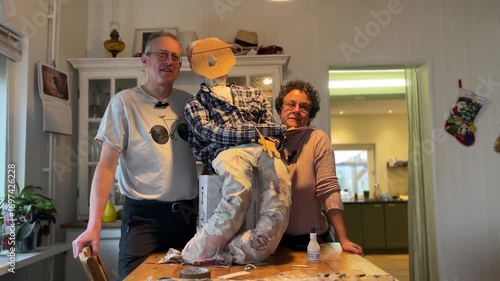 Latin American Traditions for Christmas and New Year in Europe Latin American Wife and her dutch husband proudly displays his Año Viejo effigy, crafted from recycled materials in his Amsterdam kitchen