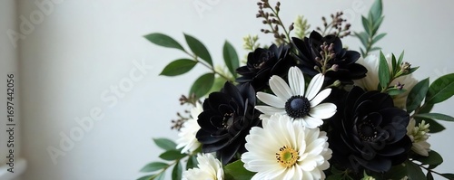 Elegant tuxedo-inspired bridal bouquet featuring black and white flowers, contrasting textures, and a sophisticated design, perfect for a modern or unconventional wedding ,  event flowers,  orchids