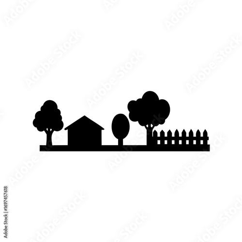 Monochrome silhouette of a cozy house with trees and a fence