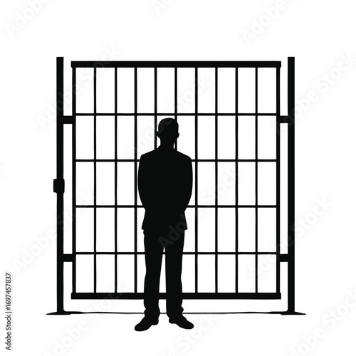 Silhouette of a man standing in front of prison bars Keywords: silhouette, man, prison, bars