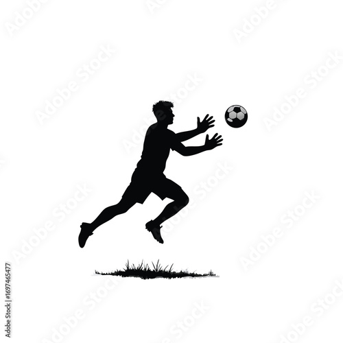Soccer player reaching for ball silhouette football