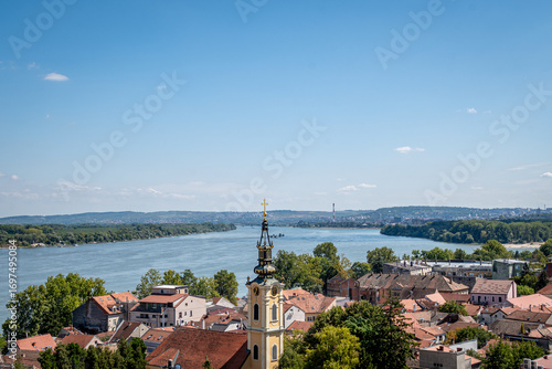 Panoramic photo from high angle of the Zemun municipality and the Danube river in the city of Belgrade. Blue sky at the horizon.