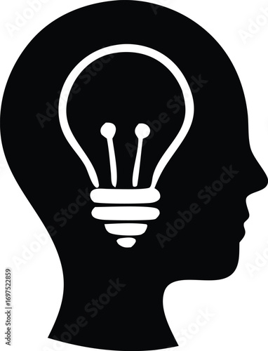 Silhouette of a human head with a bright light bulb inside symbolizing innovation ideas creativity and inspiration concept