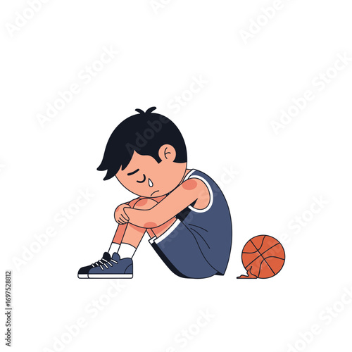 A dejected young boy, sitting on the ground, crying after a basketball game.