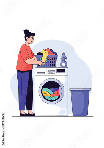Woman loads laundry basket into modern washing machine next to blue bin