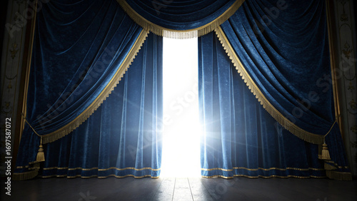 Blue velvet curtains open to reveal bright light on stage