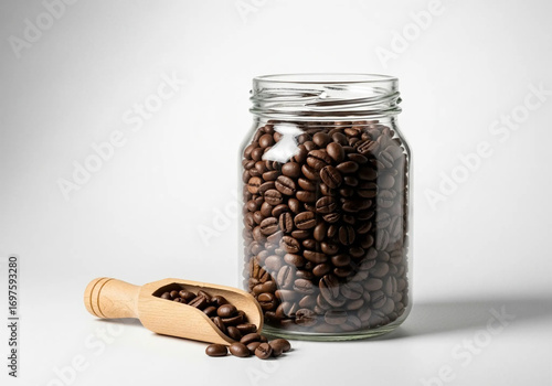 Roasted Coffee Beans in Glass Jar with Wooden Scoop