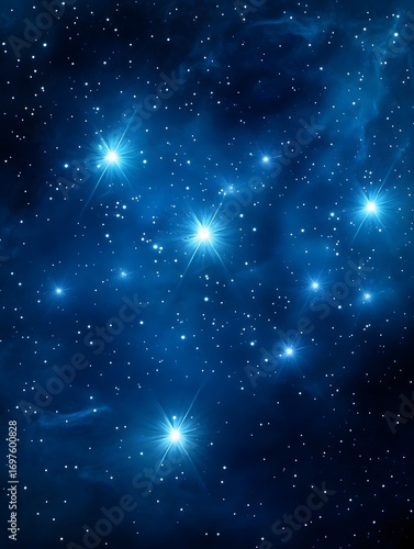 Bright stars and nebulae glow within the deep blue expanse of outer space galaxy