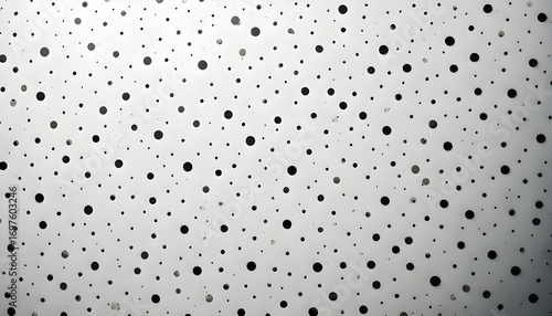 White background with black polka dot pattern that fills the entire section