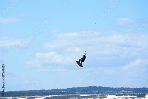 The moment of a high jump during kitesurfing (also known as kiteboarding)
