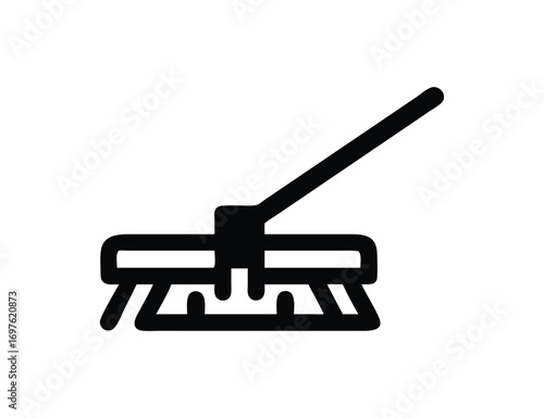 Simple black and white icon of a cleaning broom for floor maintenance and housekeeping