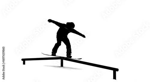 Silhouette of snowboarder executing a rail slide with balanced arms and a white background for