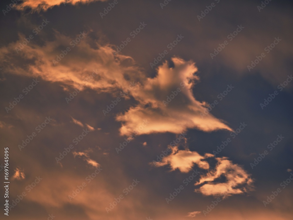 Fototapeta premium Tokyo, Japan - September 11, 2025: Dramatic color of the clouds at dawn 