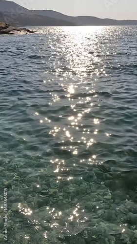 Sparkling Sunlight Reflection On Crystal Clear Mediterranean Sea Water

