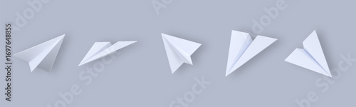 Set of origami paper airplanes. Realistic handmade planes in flat style design, isolated on gray background. Perfect for school projects, travel themes, and creative decoration.