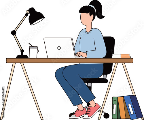 Woman working on laptop at desk
