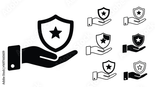 Hand holding shield with star for protection