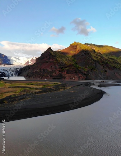 Mountainous landscape with a glacier and a river